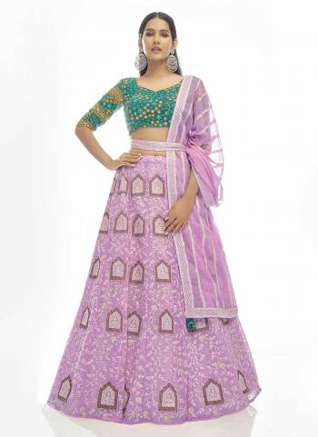 You Will Definitely Earn Lots Of Compliments Wearing This Heavy Designer Lehenga Choli In All Over Color. Its Pretty Blouse, Lehenga and Dupatta Are Fabricated On Fine Beautified with Embroidery Work. Buy This Elegant Peice Now.