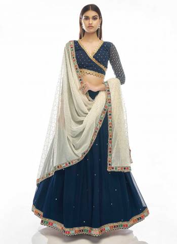 You Will Definitely Earn Lots Of Compliments Wearing This Heavy Designer Lehenga Choli In All Over Color. Its Pretty Blouse, Lehenga and Dupatta Are Fabricated On Fine Beautified with Embroidery Work. Buy This Elegant Peice Now.