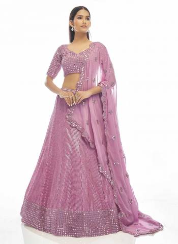 You Will Definitely Earn Lots Of Compliments Wearing This Heavy Designer Lehenga Choli In All Over Color. Its Pretty Blouse, Lehenga and Dupatta Are Fabricated On Fine Beautified with Embroidery Work. Buy This Elegant Peice Now.