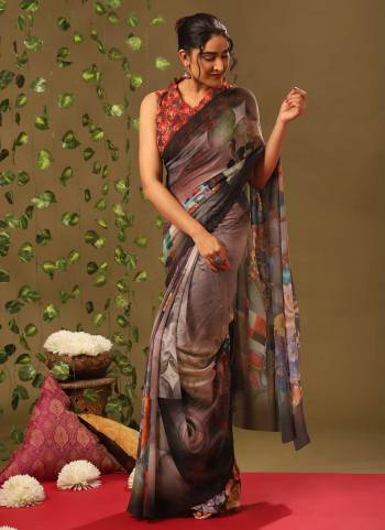 Grab These Saree in Fine Colored Pair With Blouse.These Saree And Blouse Are Fabricated On Georgette.Its Beautified With Designer Fancy Digital Printed Work.