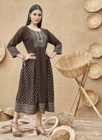 Grab These Beautiful Colored Kurti.Its Fabricated On Rayon Come With Designer Foil Printed Work.