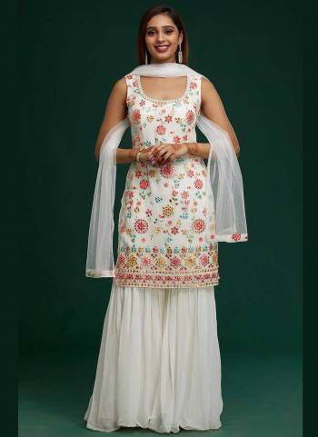 Grab These Sharara Suit in Fine Colored Pair With Bottom And Dupatta.These Top And Bottom Are Fabricated On Faux Georgette Pair With Net Dupatta.Its Beautified With Heavy Designer Embroidery Work.