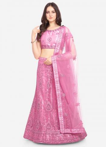 Grab These Fine Colored Semi Stiched Lehenga Choli Pair With Designer Blouse And Dupatta.These Lehenga And Blouse Are Fabricated On Net Pair With Net Dupatta.Its Beautified With Heavy Designer Embroidery Work.