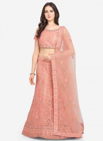 Grab These Fine Colored Semi Stiched Lehenga Choli Pair With Designer Blouse And Dupatta.These Lehenga And Blouse Are Fabricated On Net Pair With Net Dupatta.Its Beautified With Heavy Designer Embroidery Work.