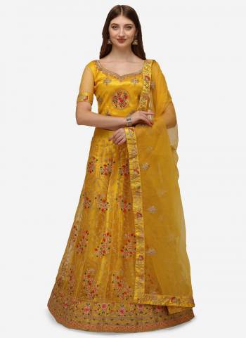 Grab These Fine Colored Semi Stiched Lehenga Choli Pair With Designer Blouse And Dupatta.These Lehenga And Blouse Are Fabricated On Net Pair With Net Dupatta.Its Beautified With Heavy Designer Embroidery Work.