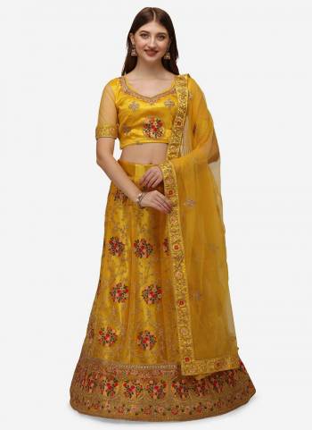 Grab These Fine Colored Semi Stiched Lehenga Choli Pair With Designer Blouse And Dupatta.These Lehenga And Blouse Are Fabricated On Net Pair With Net Dupatta.Its Beautified With Heavy Designer Embroidery Work.