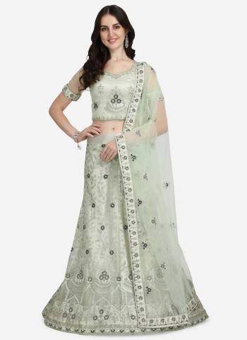 Grab These Beautiful Colored Lehenga Choli Pair With Designer Blouse And Dupatta.These Lehenga And Blouse Are Fabricated On Net Pair With Dupatta.Its Beautified With Designer Work.