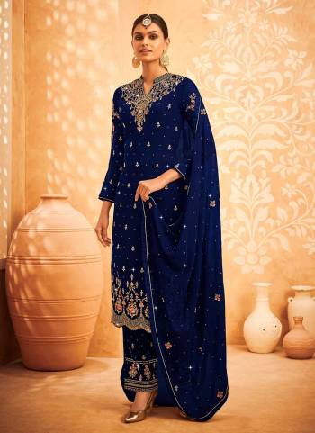 For A Designer Look,Grab These Plazzo Suit in Fine Colored.These Top Is Fabricated On Faux Georgette Pair With Santoon Bottom And Georgette Dupatta.Its Beautified With Heavy Designer Work.