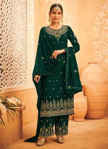 For A Designer Look,Grab These Plazzo Suit in Fine Colored.These Top Is Fabricated On Faux Georgette Pair With Santoon Bottom And Georgette Dupatta.Its Beautified With Heavy Designer Work.