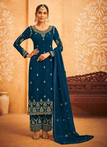 For A Designer Look,Grab These Plazzo Suit in Fine Colored.These Top Is Fabricated On Faux Georgette Pair With Santoon Bottom And Georgette Dupatta.Its Beautified With Heavy Designer Work.