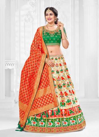 For Adesigner Look,Grab These Designer Lehenga in All Over Fine Colored Pair With Designer Blouse And Dupatta.These Lehenga And Dupatta Are Fabricated On Silk Jacquard Pair With Silk Blouse.Its Beautified With Wevon Designer, Embroidery,Stone Work.