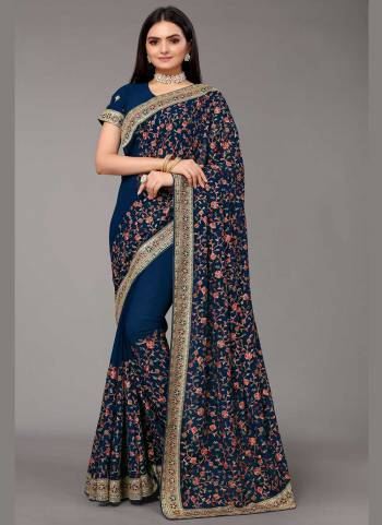 For A Designer Look,Grab These Saree in Fine Colored Pair With Blouse.These Saree And Blouse Are Fabricated On Georgette.Its Beautified With Heavy Multy Thread Embroidery Work.