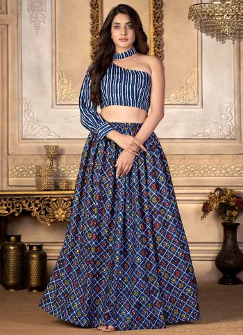 Grab These Beautiful Choli And Skirt in Fine Colored.These Choli And Skirt Are Fabricated On Moscow Silk.Its Beautified With Bandhani Printed Work.