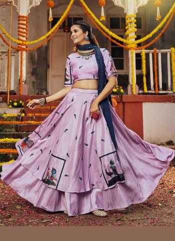 Grab These Traditional Lehenga in Fine Colored Pair With Blouse And Dupatta.These Lehenga Is Fabricated On Silk Pair With Silk Blouse And Muslin Cotton Dupatta.Its Beautified With Digital Printed,Designer Embroidery Work.