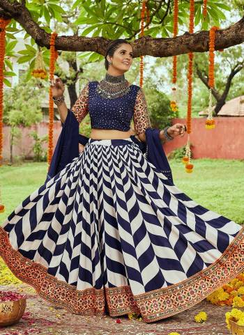 Grab These Traditional Lehenga in Fine Colored Pair With Blouse And Dupatta.These Lehenga Is Fabricated On Muslin Cotton Pair With Muslin Cotton Blouse And Muslin Cotton Dupatta.Its Beautified With Digital Printed,Designer Embroidery Work.