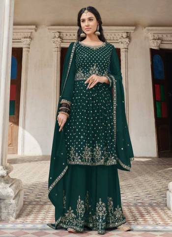 Grab These Suit in All Over Fine Colored Pair With Bottom And Dupatta.These Top And Bottom Are Fabricated On Faux Georgette Pair With Faux Georgette Dupatta.Its Beautified With Heavy Designer Embroidery Work.