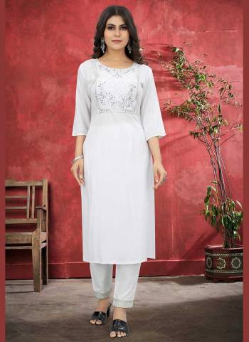 For A Beautiful Look,GrabThese Readymade Pair in All Over Fine Colored Pair With Fancy Bottom.These Top And Bottom Are Fabricated On Rayon Cotton.Its Beautified With Designer Sequance Embroidery Work.Its Available in All Regular Size.