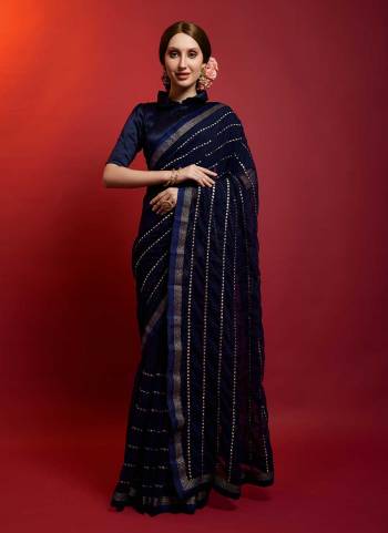 For A Diffrent Look,Grab These Saree in All Over Fine Colored Pair With Blouse.These Saree is Fabricated On Georgette Pair With  Satin Banglori Silk.its Beautified With Paper Mirror Embroidery Linening Work.