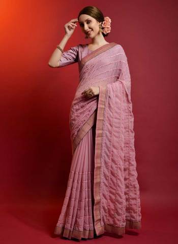 For A Diffrent Look,Grab These Saree in All Over Fine Colored Pair With Blouse.These Saree is Fabricated On Georgette Pair With  Satin Banglori Silk.its Beautified With Paper Mirror Embroidery Linening Work.