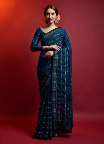 For A Diffrent Look,Grab These Saree in All Over Fine Colored Pair With Blouse.These Saree is Fabricated On Georgette Pair With  Satin Banglori Silk.its Beautified With Paper Mirror Embroidery Linening Work.