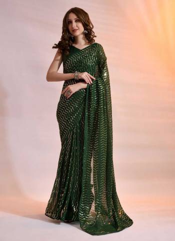 For A Casual Wear,Grab These Saree in All Over Fine Colored Pair With Blouse.These Saree is Fabricated On Georgette Pair With Satin Banglori Silk Blouse.Its Beautified With Designer Sequance Embroidery Work.