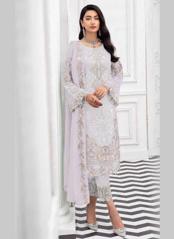 For A Beautiful Look,Grab These Suit in All Over Fine Colored Pair With Bottom And Dupatta.These Top Is Fabricated On Faux Georgette Pair With Santoon Bottom And Nazmin Dupatta.its Beautified With Heavy Designer Embroidery Work.