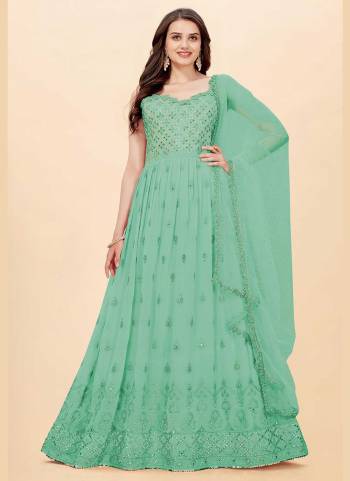 For A Designer Look,Grab These Suit in All Over Fine Colored Pair With Bottom And Dupatta.These Top Is Fabricated On Faux Georgette Pair With Santoon Bottom And Butterfly Net Dupatta.Its Beautified With Designer Sequance,Mirror Embroidery Work.