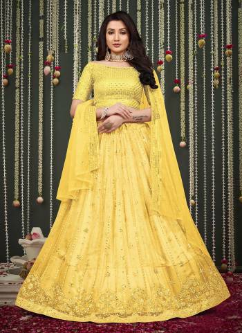 For A Different Looking Lehenga in Fine Colored Pair With Blouse And Dupatta.These Lehenga And Blouse Are Fabricated On Butterfly Net Pair With Butterfly Net Dupatta.Its Beautified With Designer Thread,Mirror Embroidery Work.