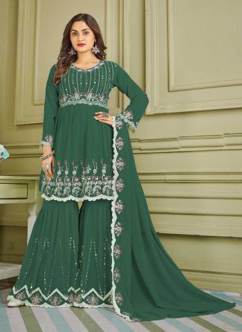 Grab These Sharara Suit in Beautiful Colored Pair With Bottom And Dupatta.These Top And Bottom Are Fabricated On Faux Georgette Pair With Faux Georgette Dupatta.Its Beautified With Designer Multy,Real Mirror Embroidery Work.