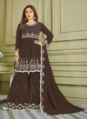 Grab These Sharara Suit in Beautiful Colored Pair With Bottom And Dupatta.These Top And Bottom Are Fabricated On Faux Georgette Pair With Faux Georgette Dupatta.Its Beautified With Designer Multy,Real Mirror Embroidery Work.