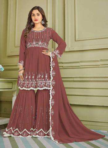 Grab These Sharara Suit in Beautiful Colored Pair With Bottom And Dupatta.These Top And Bottom Are Fabricated On Faux Georgette Pair With Faux Georgette Dupatta.Its Beautified With Designer Multy,Real Mirror Embroidery Work.