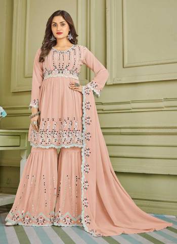 Grab These Sharara Suit in Beautiful Colored Pair With Bottom And Dupatta.These Top And Bottom Are Fabricated On Faux Georgette Pair With Faux Georgette Dupatta.Its Beautified With Designer Multy,Real Mirror Embroidery Work.