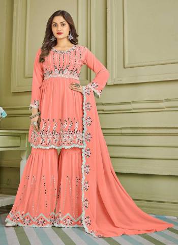 Grab These Sharara Suit in Beautiful Colored Pair With Bottom And Dupatta.These Top And Bottom Are Fabricated On Faux Georgette Pair With Faux Georgette Dupatta.Its Beautified With Designer Multy,Real Mirror Embroidery Work.