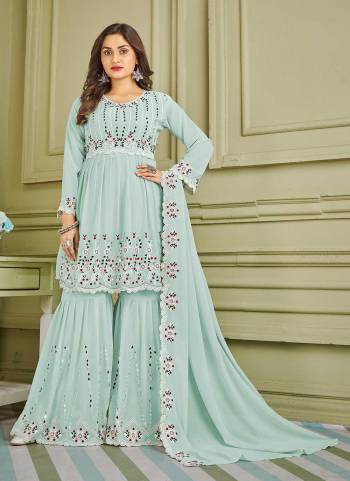 Grab These Suit in Fine Colored Pair With Bottom And Dupatta.These Top And Bottom Are Fabricated On Faux Georgette Pair With Faux Georgette Dupatta.Its Beautified With Designer Multy,Real Mirror Embroidery Work.