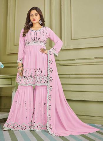 Grab These Suit in Fine Colored Pair With Bottom And Dupatta.These Top And Bottom Are Fabricated On Faux Georgette Pair With Faux Georgette Dupatta.Its Beautified With Designer Multy,Real Mirror Embroidery Work.