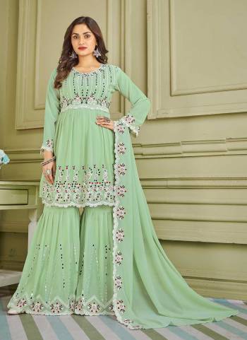 Grab These Suit in Fine Colored Pair With Bottom And Dupatta.These Top And Bottom Are Fabricated On Faux Georgette Pair With Faux Georgette Dupatta.Its Beautified With Designer Multy,Real Mirror Embroidery Work.