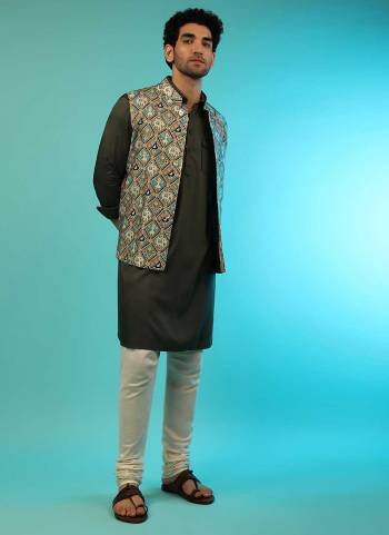 Grab These Traditional Looking Mens Wear in Fine Colored.These Kurta is Fabricated On Rayon Pair With Cotton Bottom And Satin Jacket.Its Beautified With Designer Printed Work.