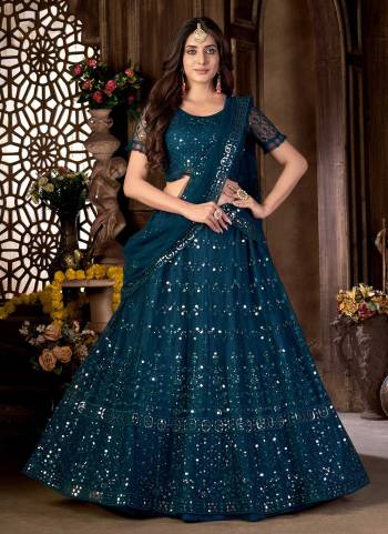 Grab These Lehenga Choli in Fine Colored Pair With Blouse And Dupatta.These Lehenga And Blouse Are Fabricated On Net Pair With Net Dupatta.Its Beautified With Heavy Designer Work.