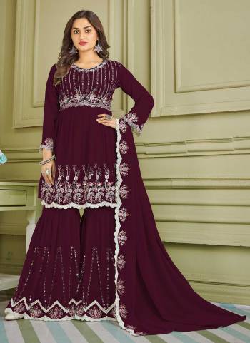 For A Beautiful Look,Grab These Sharara Suit in Fine Colored Pair With Bottom And Dupatta.These Top And Bottom Are Fabricated On Faux Georgette Pair With Faux Georgette Dupatta.Its Beautified With Designer Multy,Real Mirror Embroidery Work.