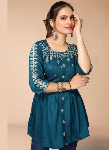 For A Casual Wear,Grab These Readymade Short Top in Fine Colored.These Top is Fabricated On Viscose Blend.Its Beautified With Thread Embroidery Work.Buy Now.