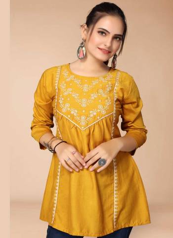 For A Casual Wear,Grab These Readymade Short Top in Fine Colored.These Top is Fabricated On Viscose Blend.Its Beautified With Thread Embroidery Work.Buy Now.