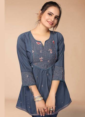 For A Casual Wear,Grab These Readymade Short Top in Fine Colored.These Top is Fabricated On Viscose Blend.Its Beautified With Thread Embroidery Work.Buy Now.