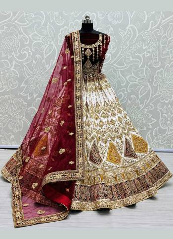 Grab These Heavy Designer Lehenga Choli in Fine Colored Pair With Blouse And Dupatta.These Lehenga And Blouse Are Fabricated On Velvet Pair With Soft Net Dupatta.Its Beautified With Dori,Thread,Sequance Embroidery,Diamond Work.