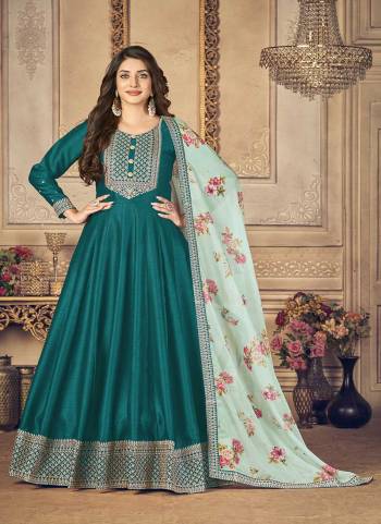 For A Designer Look,Grab These Suit in Fine Colored Pair With Bottom And Dupatta.These Top is Fabricated On Jiyo Silk Slub Pair With Santoon Bottom And Organza Dupatta.Its Beautified With Designer Embroidery And Printed Work.