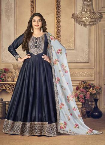 For A Designer Look,Grab These Suit in Fine Colored Pair With Bottom And Dupatta.These Top is Fabricated On Jiyo Silk Slub Pair With Santoon Bottom And Organza Dupatta.Its Beautified With Designer Embroidery And Printed Work.