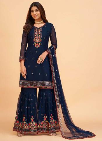 Grab These Designer Sharara Suit in Fine Colored.These Top And Bottom Are Fabricated On Georgette Pair With Georgette Dupatta.Its Beautified With Heavy Thread,Sequance,Mattie Embroidery Work.