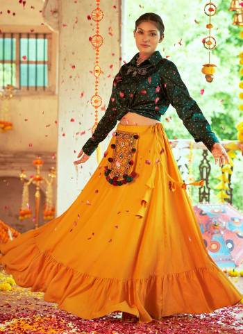 For A Beautiful Looking Skirt And Top in Fine Colored.These Top is Fabricated On Gajji Silk Pair With Cotton Skirt.Its Beautified With Printed,Embroidery Work.