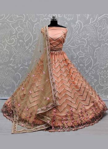 Grab These Designer Lehenga Choli in Fine Colored Pair With Blouse And Dupatta.These Lehenga And Blouse Are Fabricated On Net Pair With Soft Net Dupatta.Its Beautified With Heavy Multy Thread,Jari Embroidery,Diamond Work.