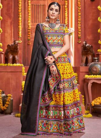 Grab These Beautiful Colored Lehenga Choli.These Lehenga And Blouse Are Fabricated On Cotton Silk Pair With Art Silk Dupatta.Its Beautified With Printed,Special Gamthi,Real Mirror Embroidery Work.