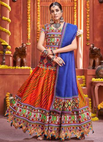 Grab These Beautiful Colored Lehenga Choli.These Lehenga And Blouse Are Fabricated On Cotton Silk Pair With Art Silk Dupatta.Its Beautified With Printed,Special Gamthi,Real Mirror Embroidery Work.